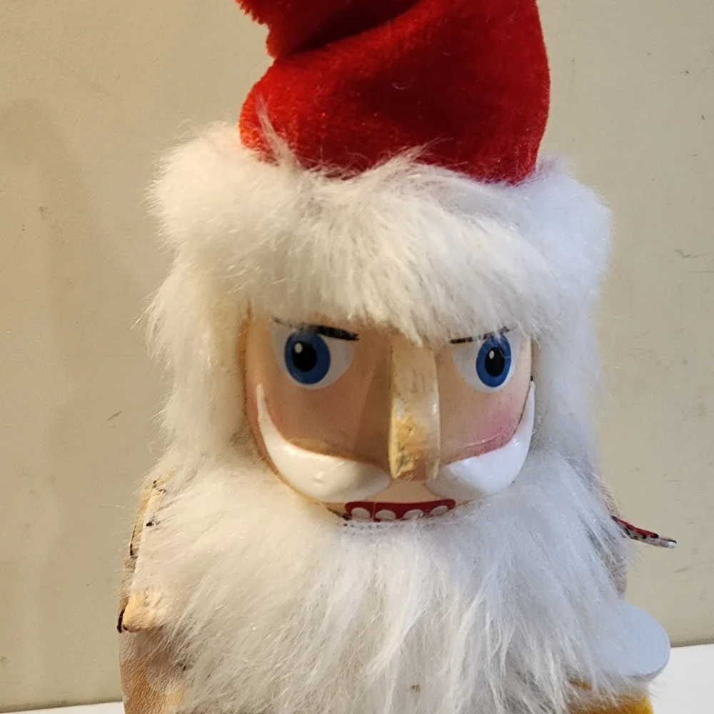 Wooden nutcracker styled as a Beachy  Santa Claus W/floral shirt, sunglasses